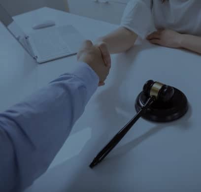 a person shaking hands with a Judge