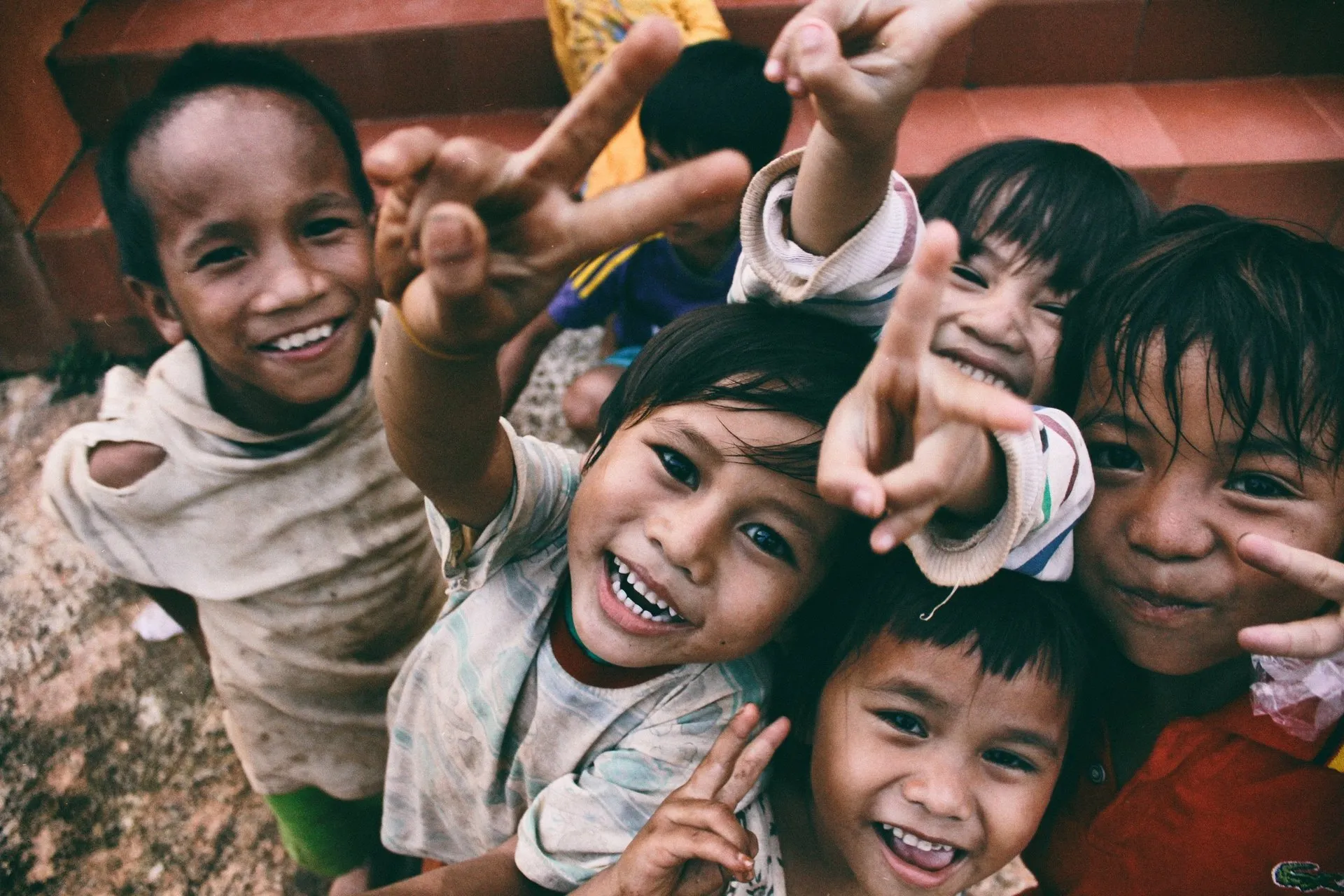 young children smiling for a photo