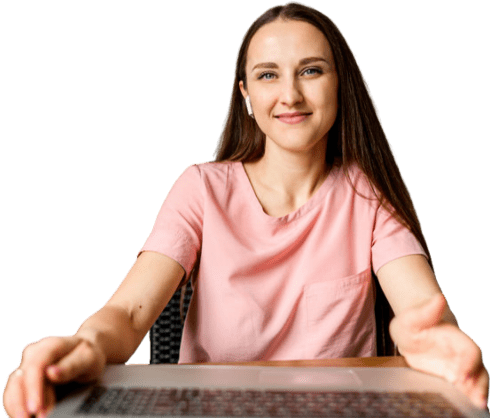 smiling woman with hands on table